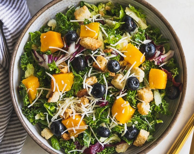 Mango Blueberry Asiago Kale Salad